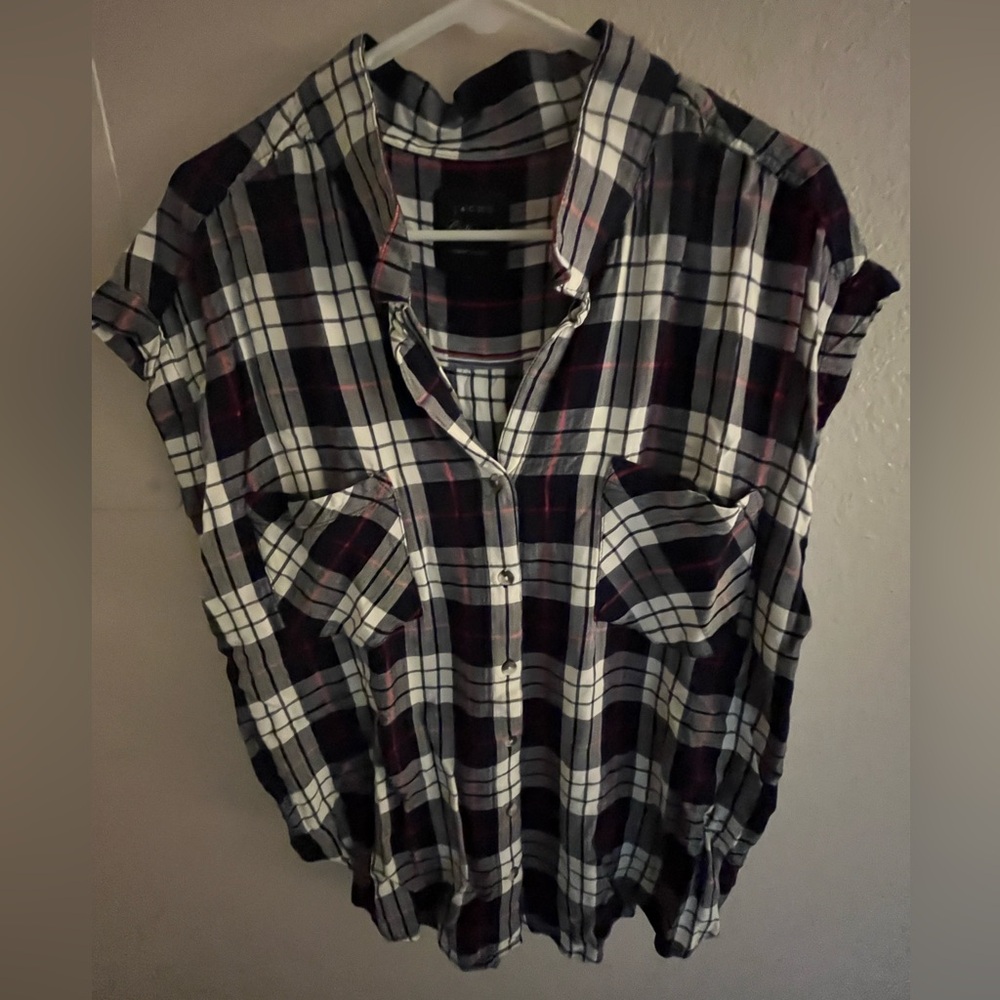 Jacks Girlfriend, cap sleeve blue and white plaid shirt.